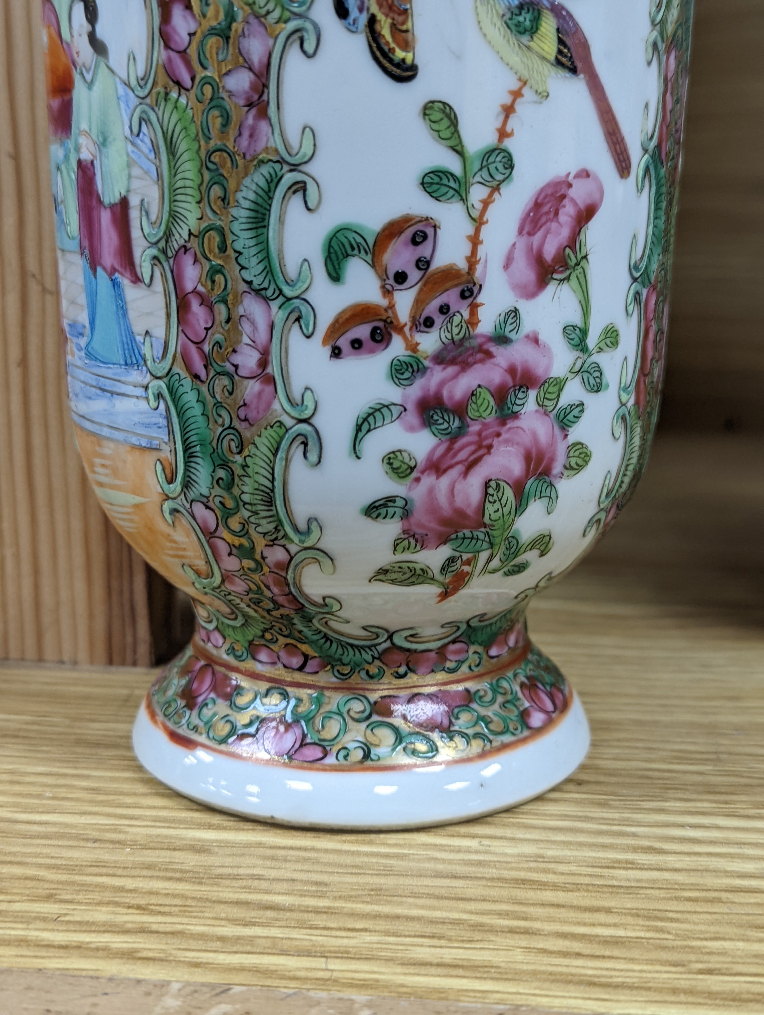 Two Chinese famille rose vases, late 19th century, tallest 26 cm, one wood stand, some restoration